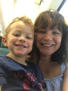 A mum and son on the train together on the way up to London