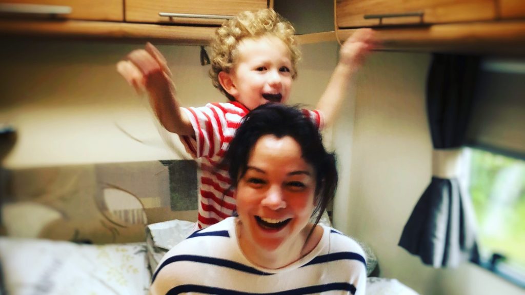 Family having fun in the caravan