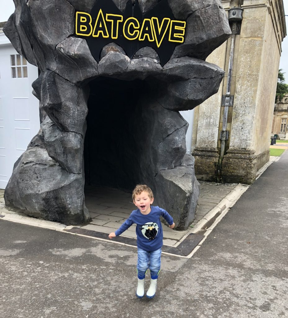 Boy outside the bat cave at Longleat Safari Park