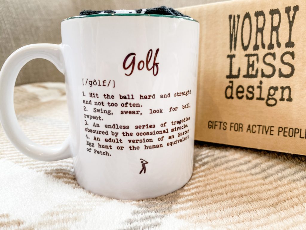 Gift set for a golfer by Worry Less Design. The perfect gift for dads who love gold. Includes mug with funny slogan and socks with a secret message on the heel.