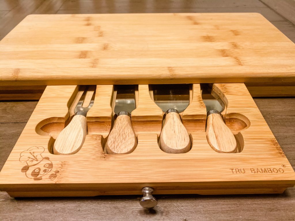 cheese knifes and forks in the built in draw of the bamboo cheese board from Tru Bamboo.