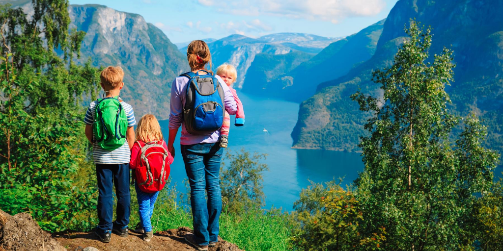 Family looking over at the lake and mountains
