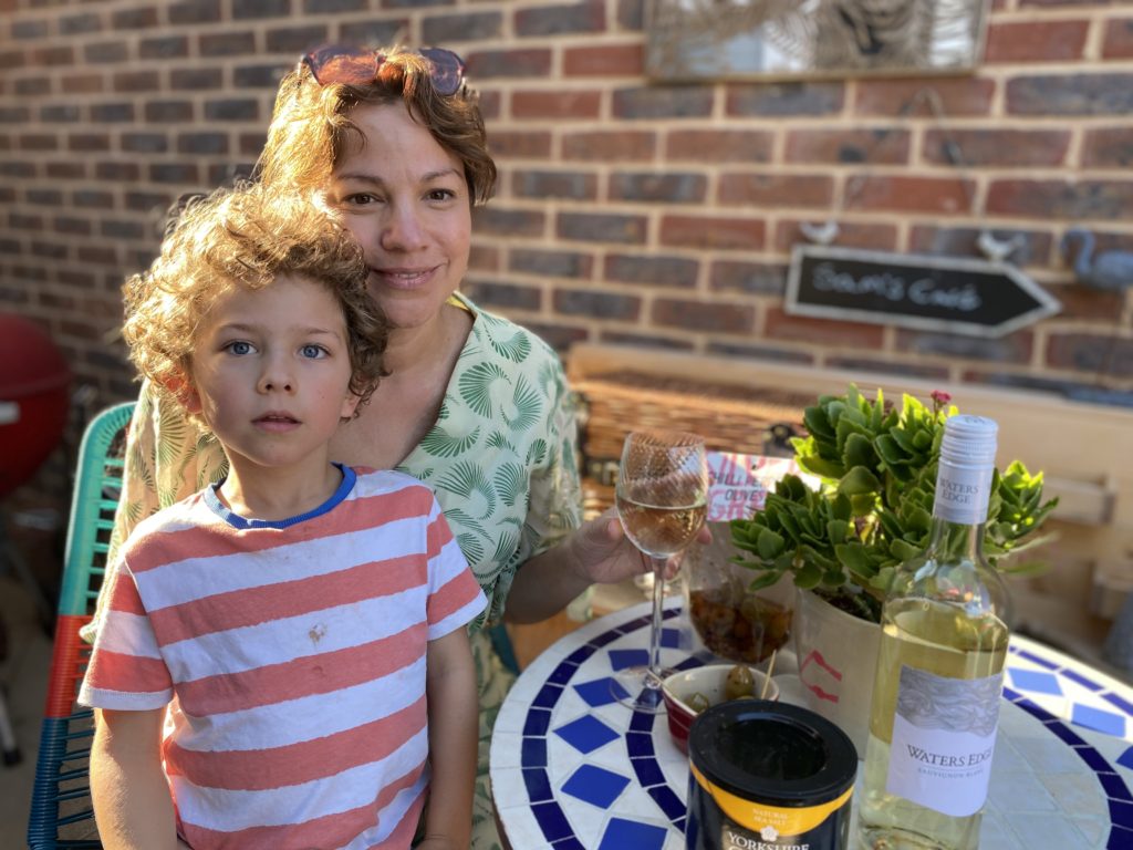 Mum and son enjoyinf gamily time on their patio