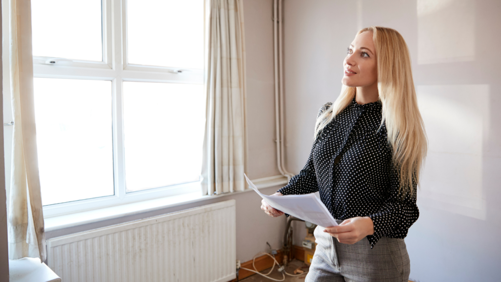 Mumpreneur looking at plans for renovating a house