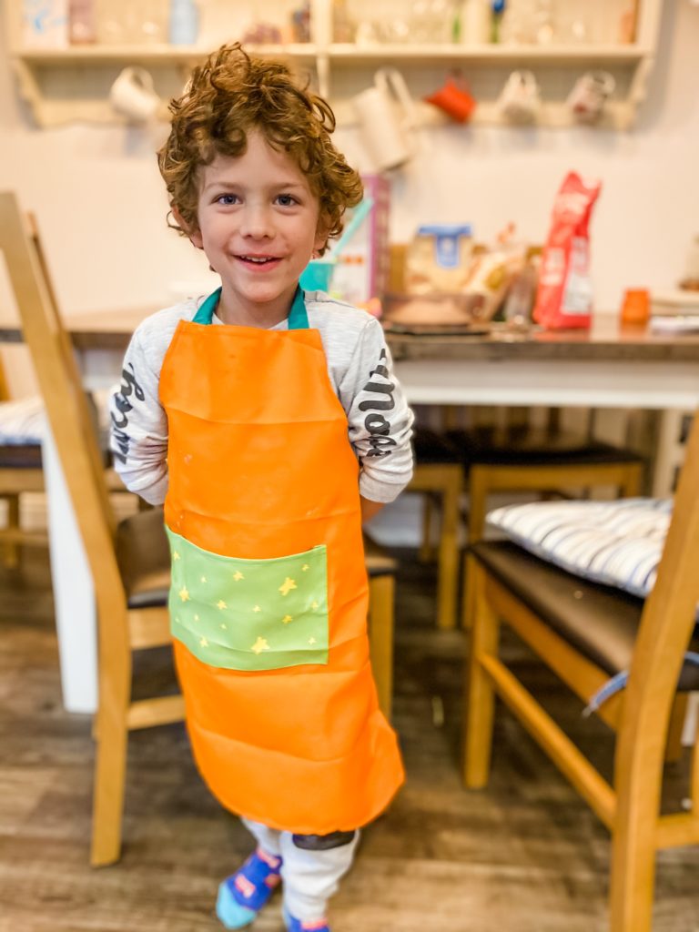 Boy in Apron from Nadiya's Deluxe Baking Set