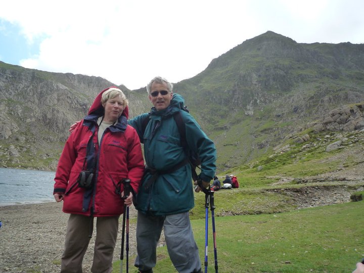 A couple climbing snowdon