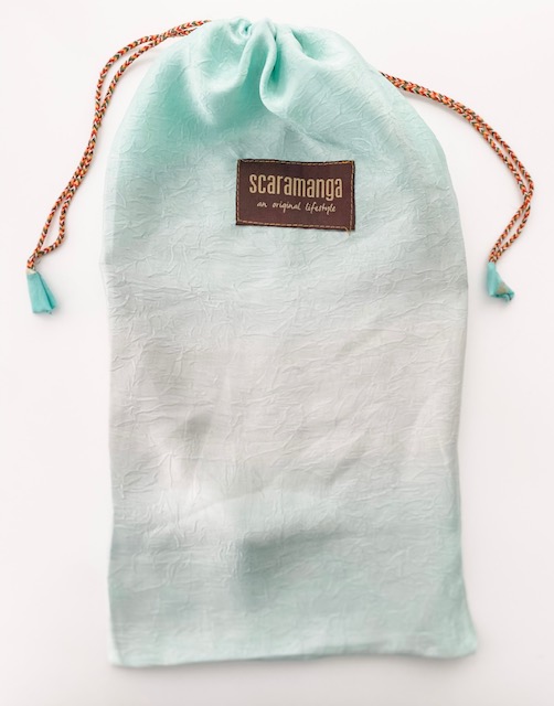 Scaramanga gifts are packaged beautifully in green bag