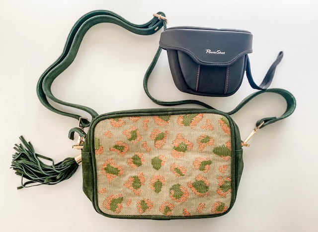 green and gold camera bag by le jaana with camera for scale