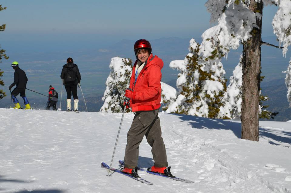 Lady skiing in the Toodos Mountains in Cyprus in February