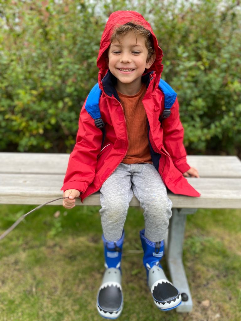 Boy in his regatta coat and wellies