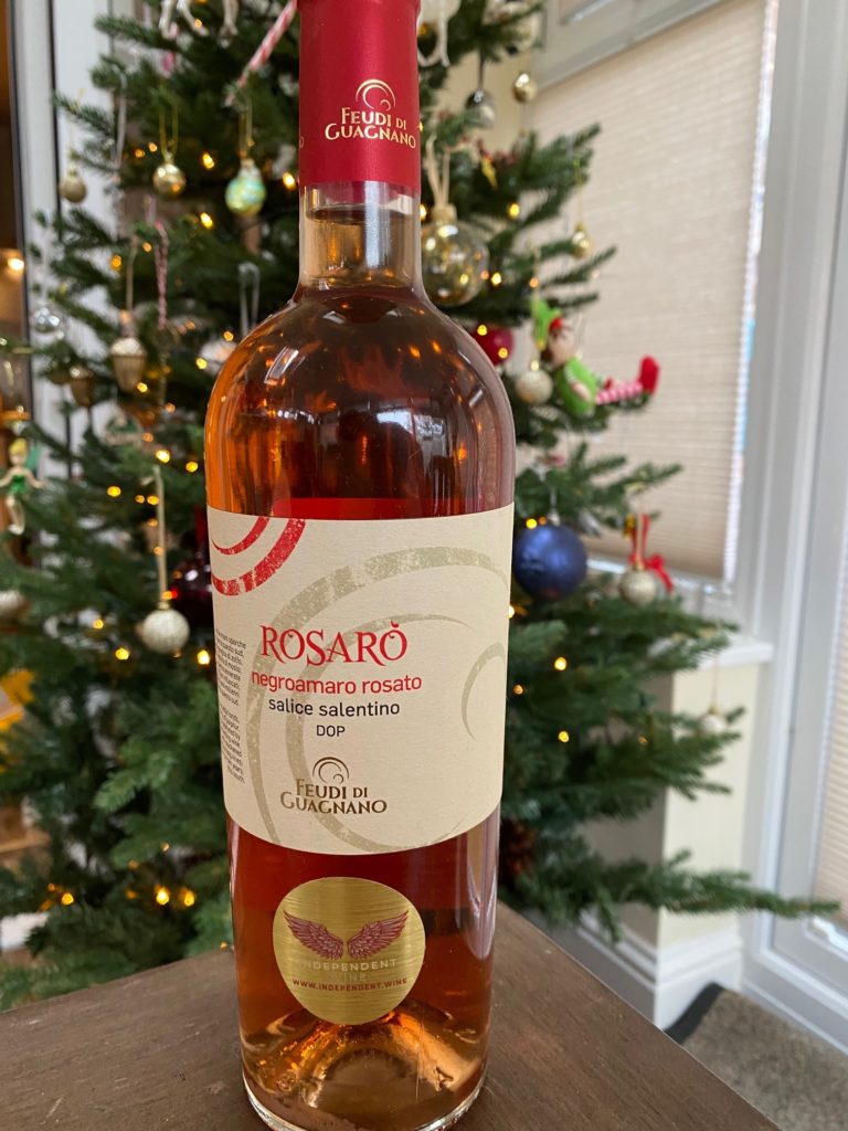 Rosaro rose wine in front of christmas tree