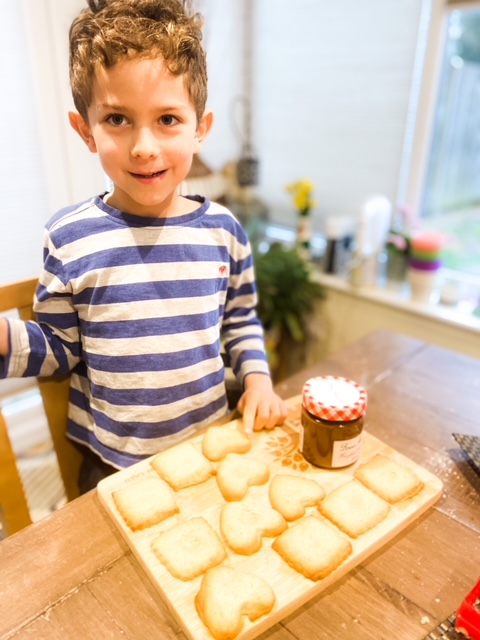Shortcake biscuits baked and chocolate Bonne Maman ready to be opened to add to the biscuitspread jar