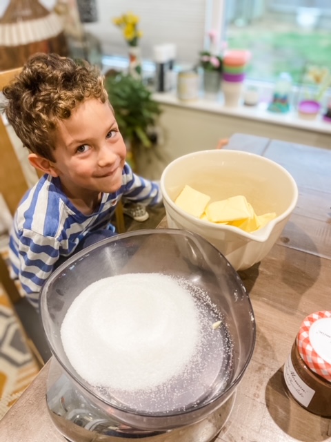 Boy baking shortcake biscuits