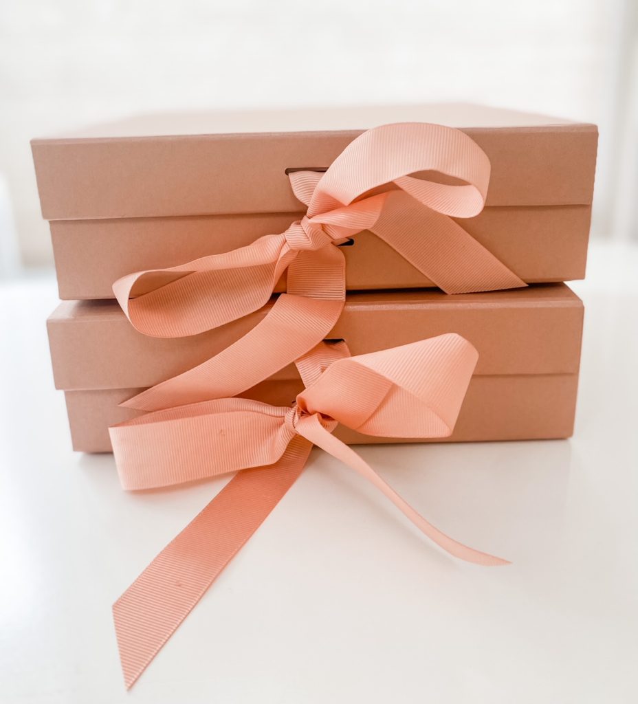 Two cupcake gift boxes waiting to be opened