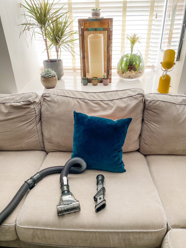 The Hoover Upright 300 attachments on recently hoovered sofa