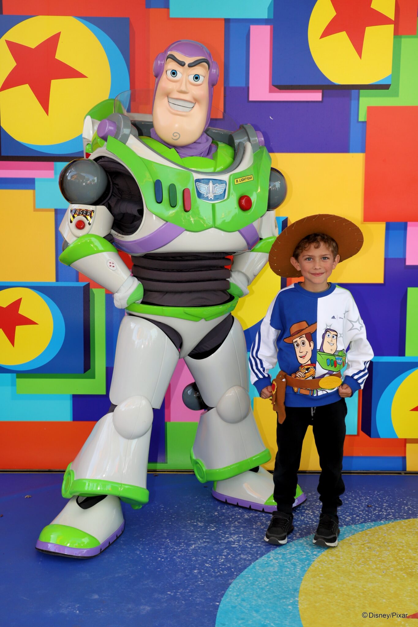boy with buzz lightyear at disneyland paris