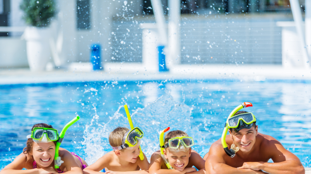 Family at the swimming pool on holiday