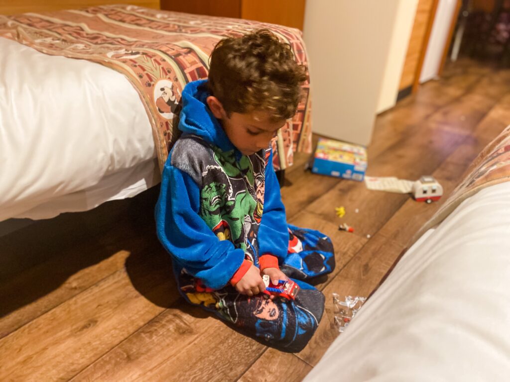 Boy in Marvel onsie at the Davy Crockett ranch at Disneyland Paris