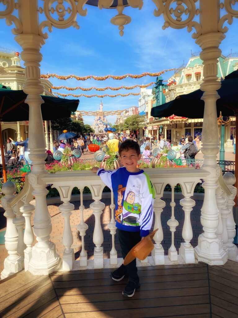 Boy at Disneyland Paris in the autumn