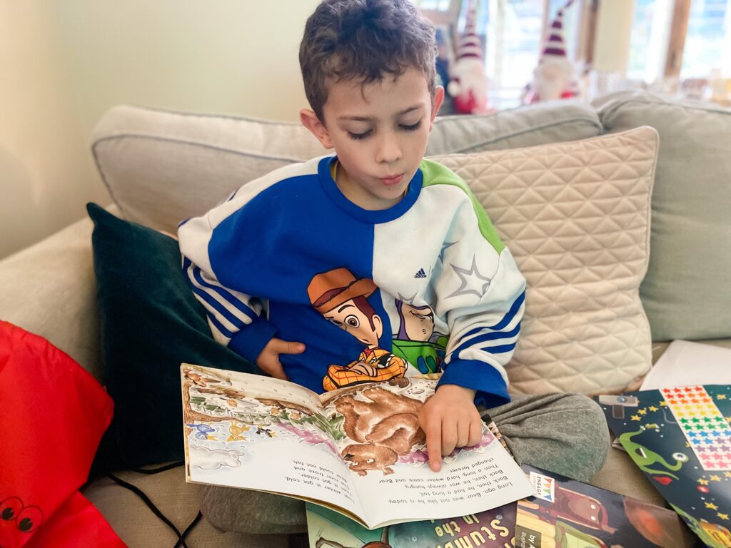 Boy learning to read