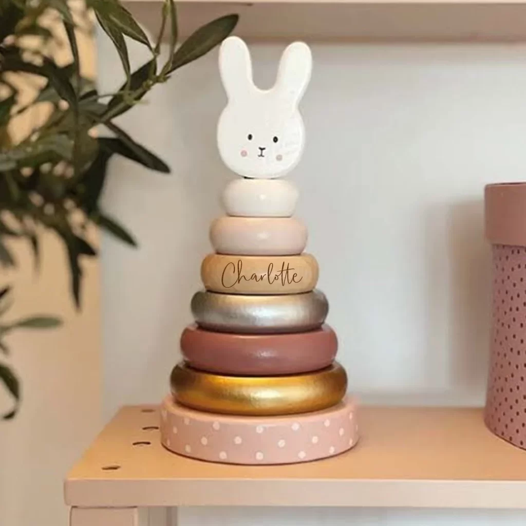 A first toy for baby - bunny stacking rings that cna be personalised with name.