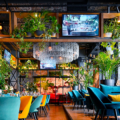 Restaurant with bright colours and plants