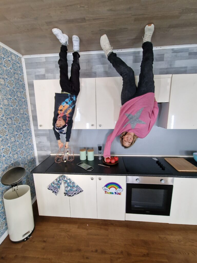 Mum and son at the Upside Down House in Brighton