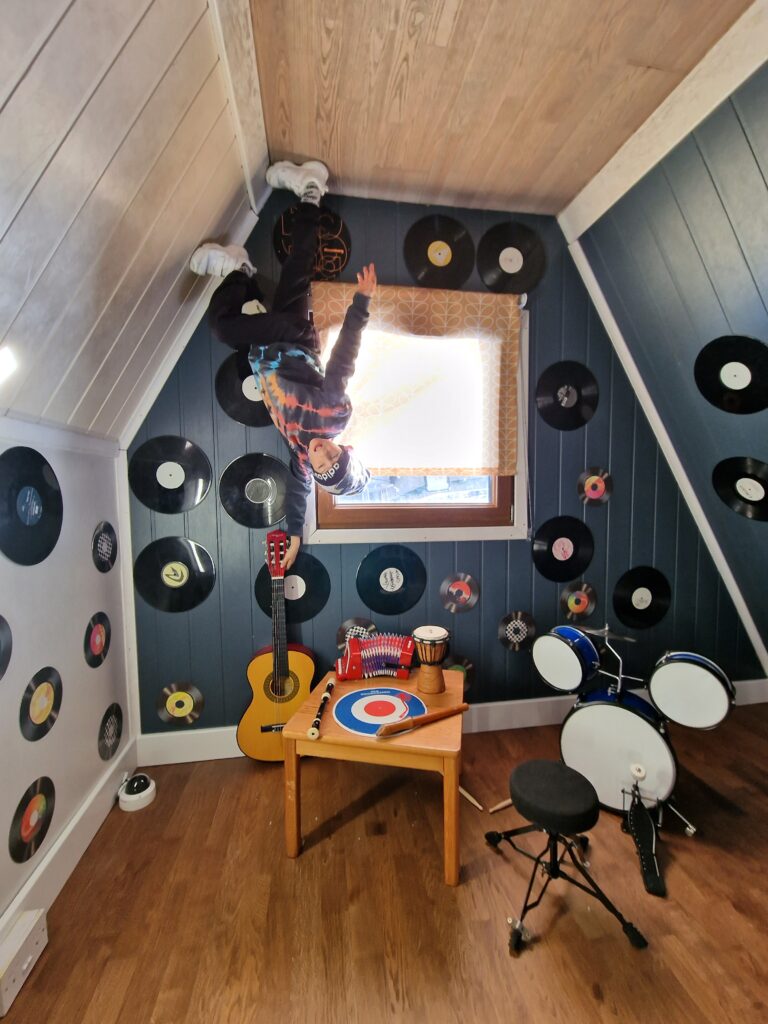 Boy at the Upside Down House in Brighton
