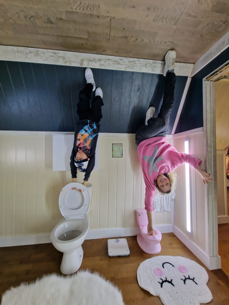 Mum and son at the Upside Down House in Brighton