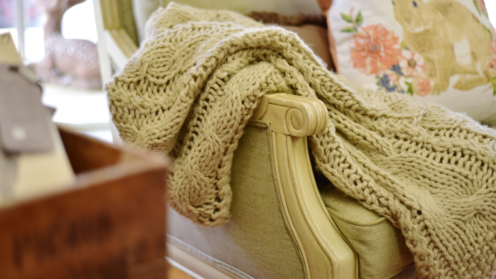 Knit throw on a sofa in a lounge