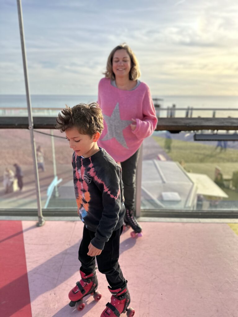 Mum and son skating at the i360