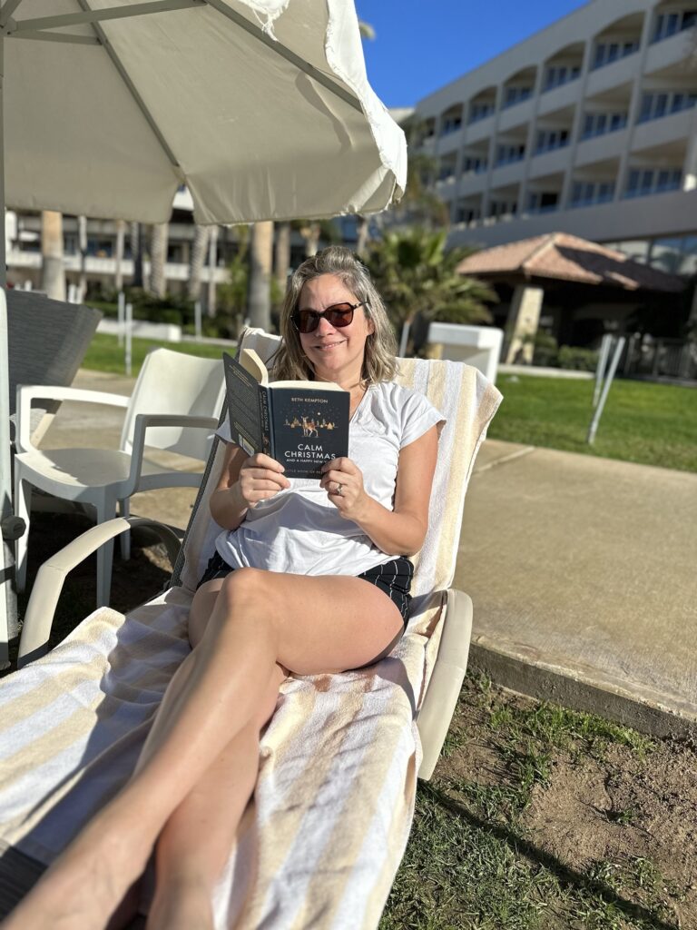 Mum on a sun lounger at Alexander the Great Beach Hotel