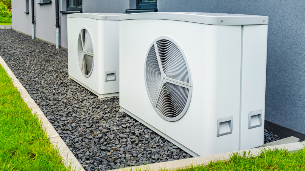 Two heat pumps outside a modern home in the south east