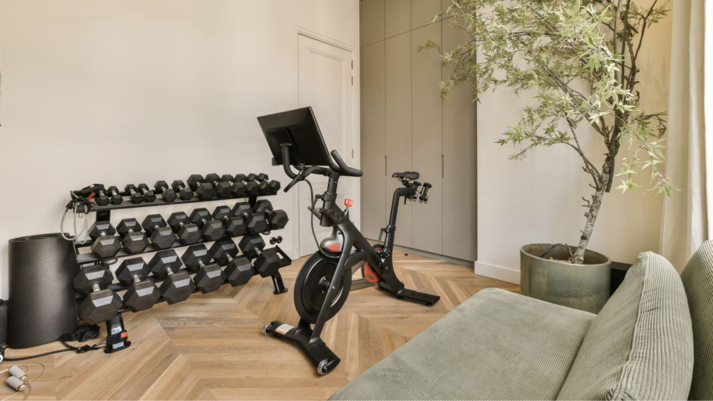 Home gym set up in the spare room with weights and equipment