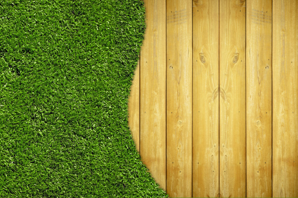 Artifical grass next to decking