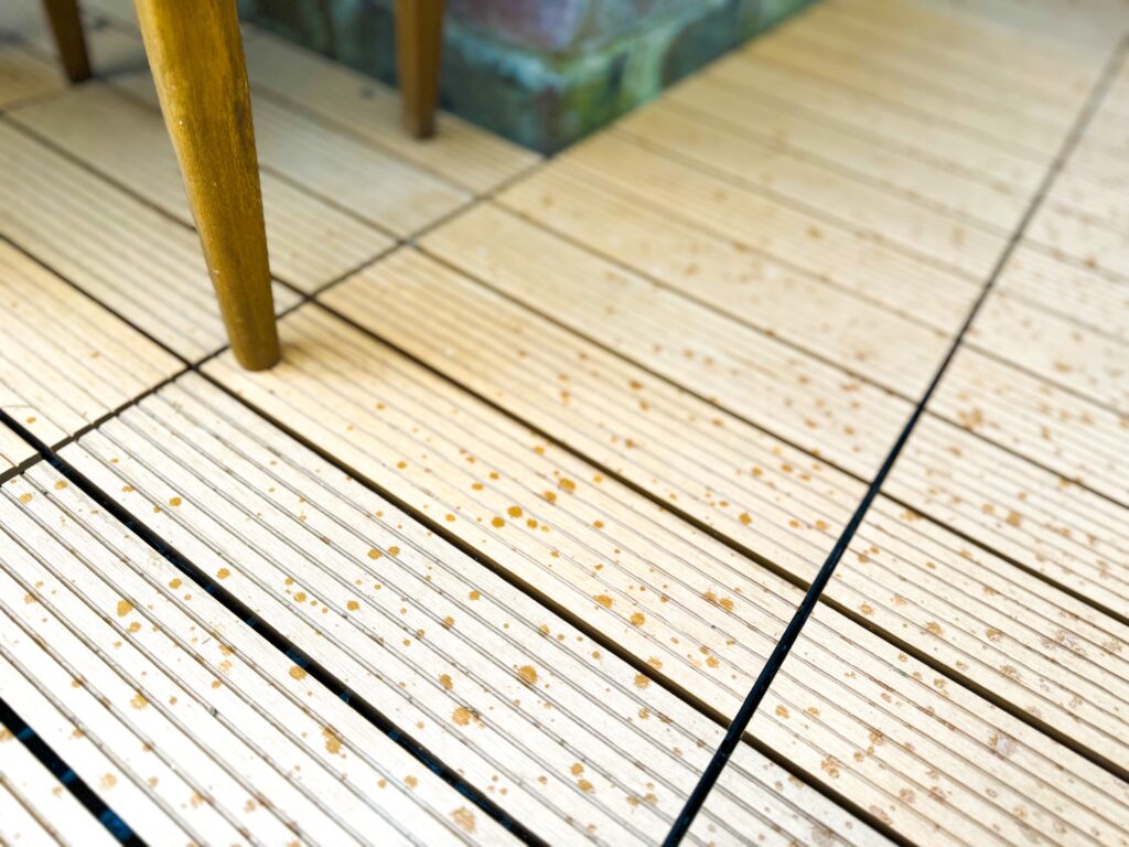 Brown composite deck in the rain