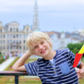 Boy in Belgium holding Belgium flag