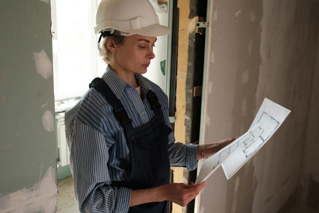 Female engineer making improvements to a home