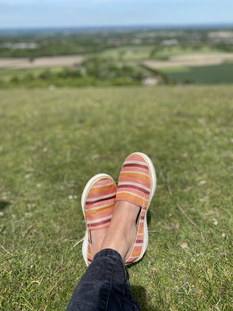 Ladies foot relaxing on the south downs