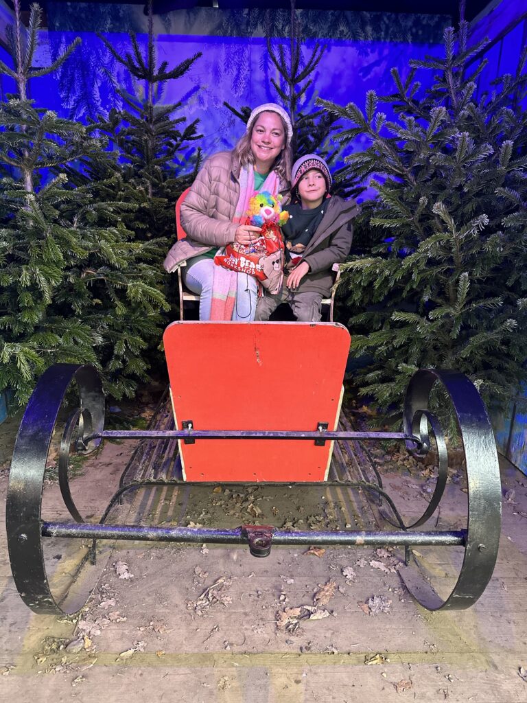 Mum and son at Tulleys Farm Christmas Santa experience in sussex