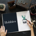 Creative designer working on creating a hobbies workbook