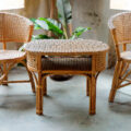 Stylish rattan furniture set consisting of small table and two chairs