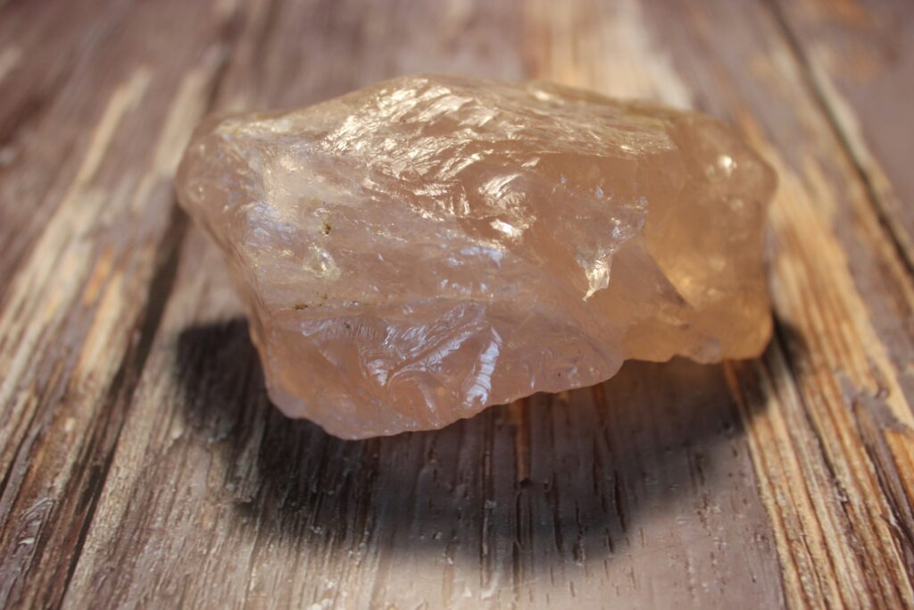 A beautiful crystal on a wooden floor