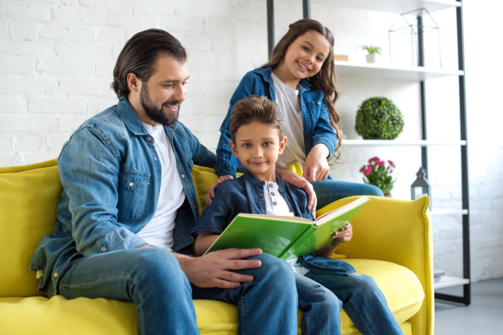 Dad educating son and daughter about menstruation and periods