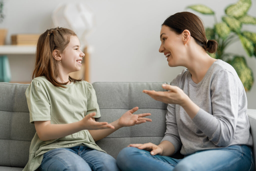 Mum talking to her daughter about mensuration