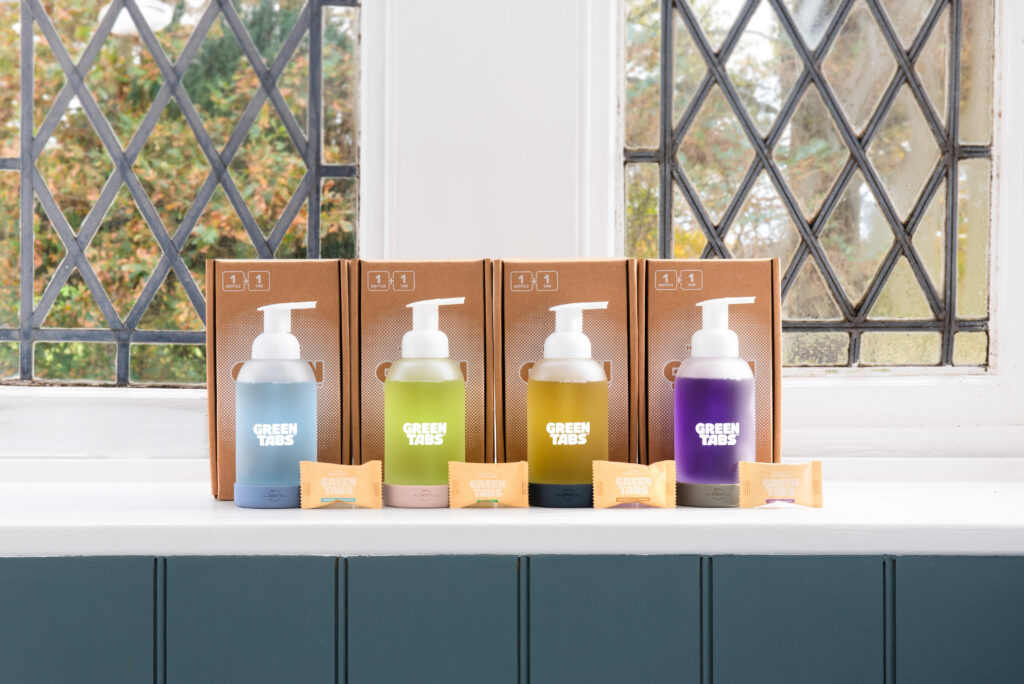 Sustainable foaming hand soaps on windowsill