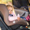 Infant baby girl in car seat
