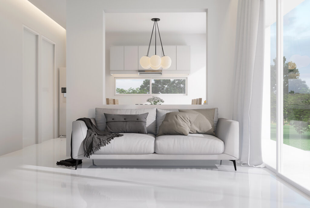 Interior of white living room with french windows